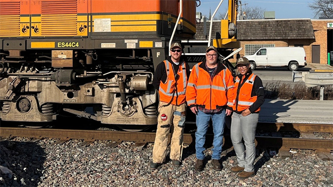 From left, Locomotive Engineer Roger Seiling Jr., and Conductor Travis Miller brought in the first Peak Season train destined for Cicero, Illinois. Pictured with them is Terminal Manager Alycia Berry. From left, Locomotive Engineer Roger Seiling Jr., and Conductor Travis Miller brought in the first Peak Season train destined for Cicero, Illinois. Pictured with them is Terminal Manager Alycia Berry.