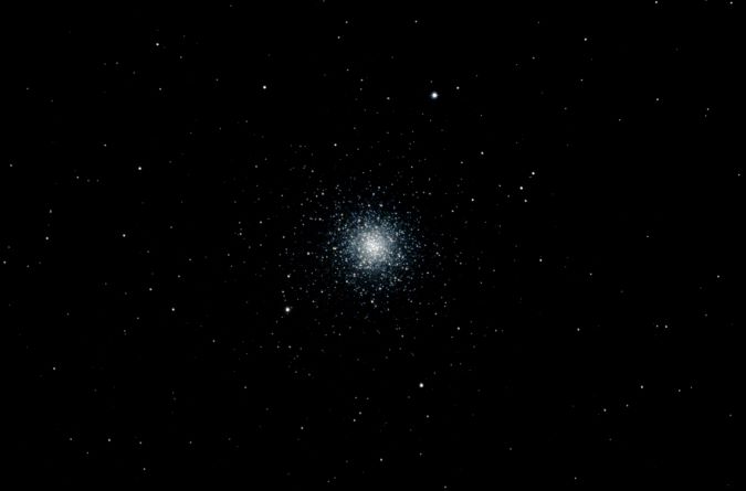 This is Fortner’s image of the globular cluster M3. It is one of about 400 globular clusters that orbit the Milky Way. They are dense balls of stars only a few light years across. They resemble the cores of captured dwarf galaxies but are thought to have formed independently of galaxies, and maybe before many galaxies. 