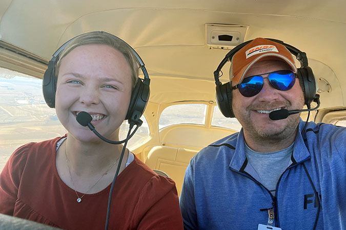 Locke with one of his students, Emily