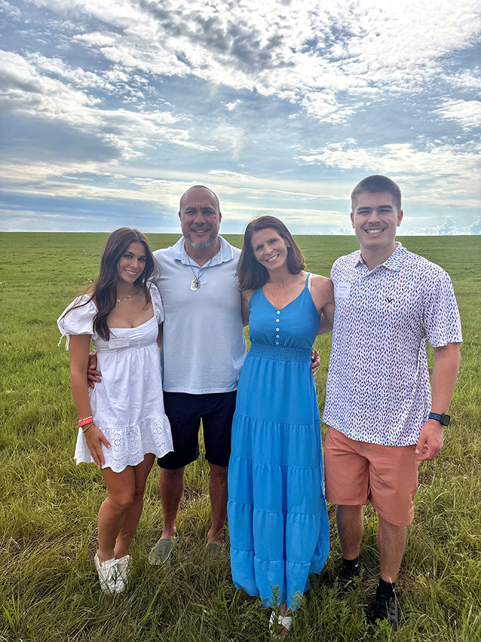 George with his wife, Kristin, and their children Emma and Hunter George with his wife, Kristin, and their children Emma and Hunter