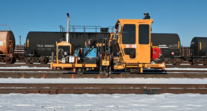 The spike puller at work. The spike puller at work.