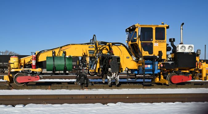 The Tripp machine slides out the ties. The Tripp machine slides out the ties.