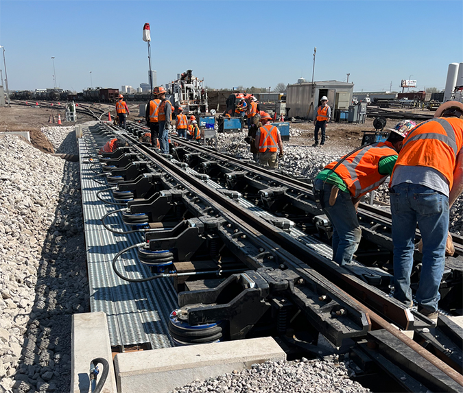 Crews working on new Group 2 bridge foundation and new Group 2 pneumatic retarder. Group 2 is a grouping of tracks within the hump yard. Crews working on new Group 2 bridge foundation and new Group 2 pneumatic retarder. Group 2 is a grouping of tracks within the hump yard.